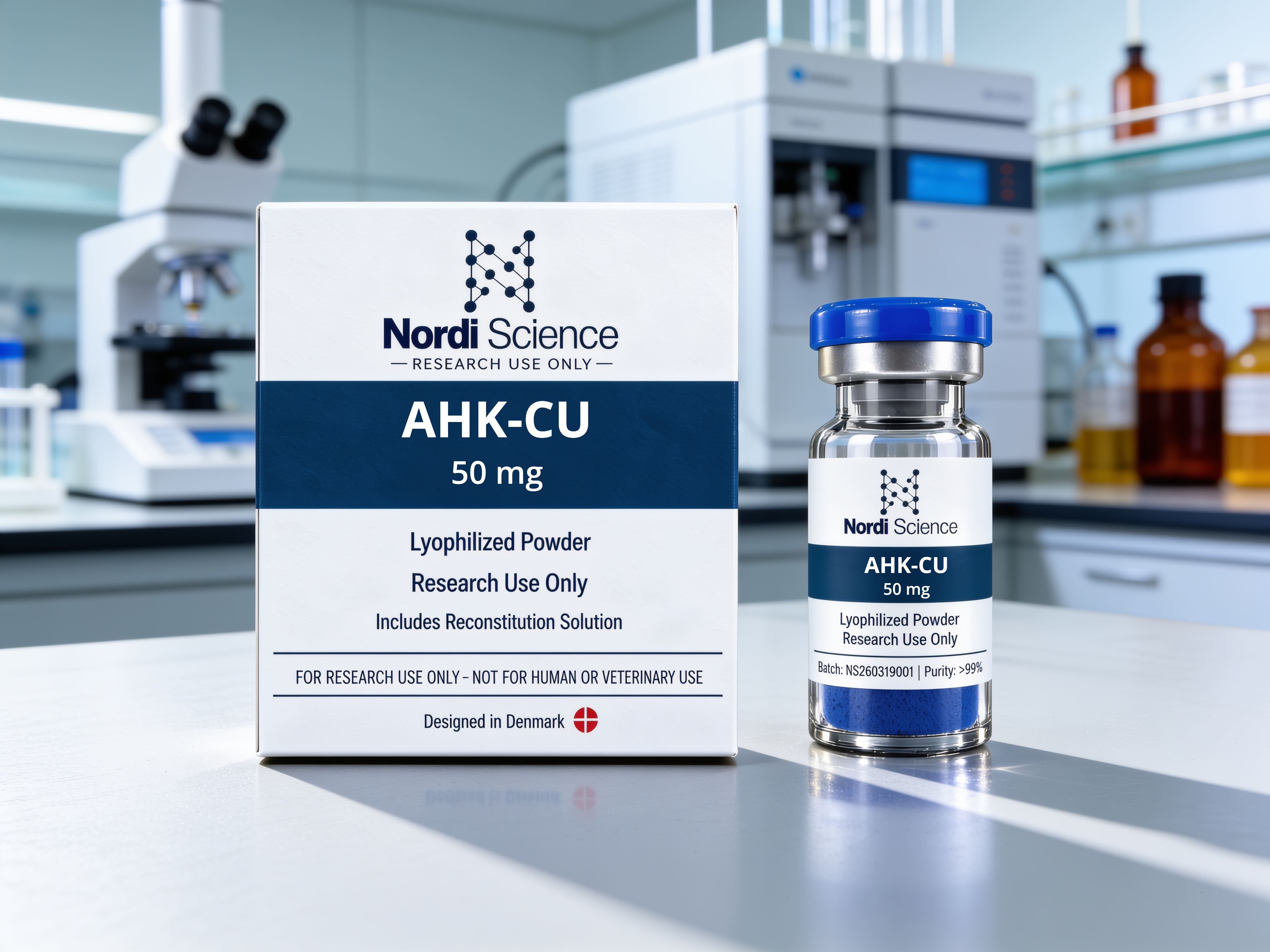 AHK-CU vial and box photographed on a laboratory bench